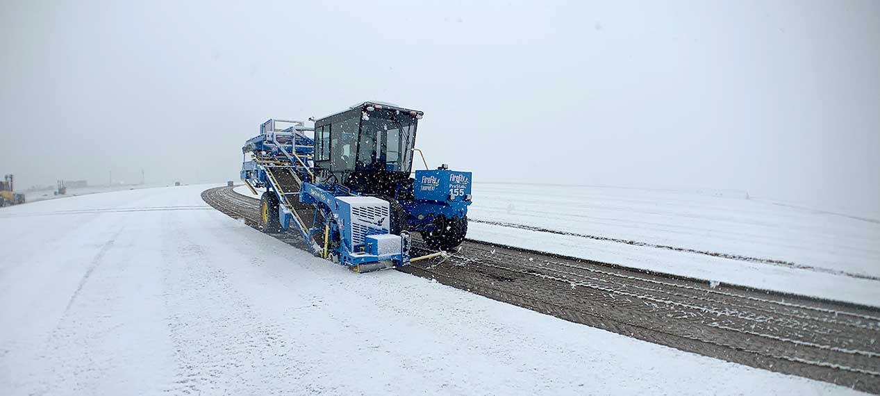 A Firefly automated sod harvest cuts sod in the winter snow in Platteville, Colorado in January, 2020.