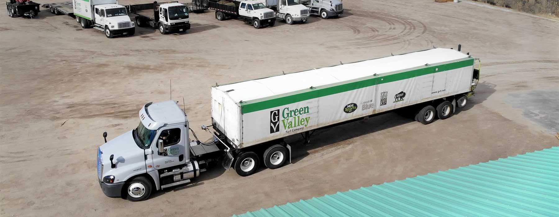 A Green Valley Turf Co. tractor trailer unloads in Littleton, Colorado.