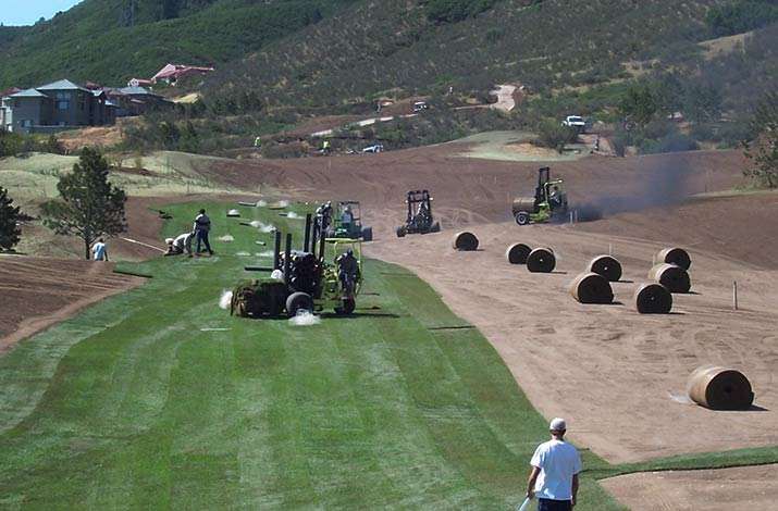 Big roll sod gets installed on a fairway at The Club at Ravenna in Littleton, CO.