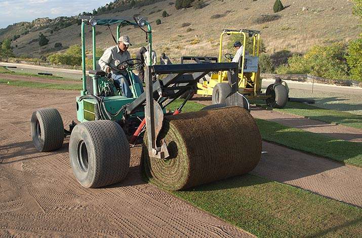 Green Valley Turf Co. big roll sod installation machines are very light on the grade and do not rut the ground as they install big roll sod at The Club at Ravenna in Littleton, CO.