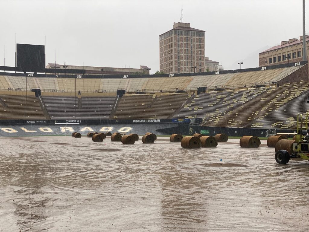 Colorado Buffaloes stadium before sod laying on a rainy day