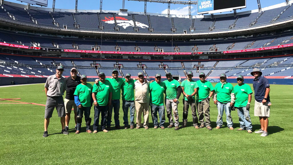 A photo of our team after finishing a sports field.